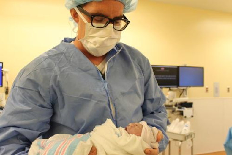 James holding Abigail Browning